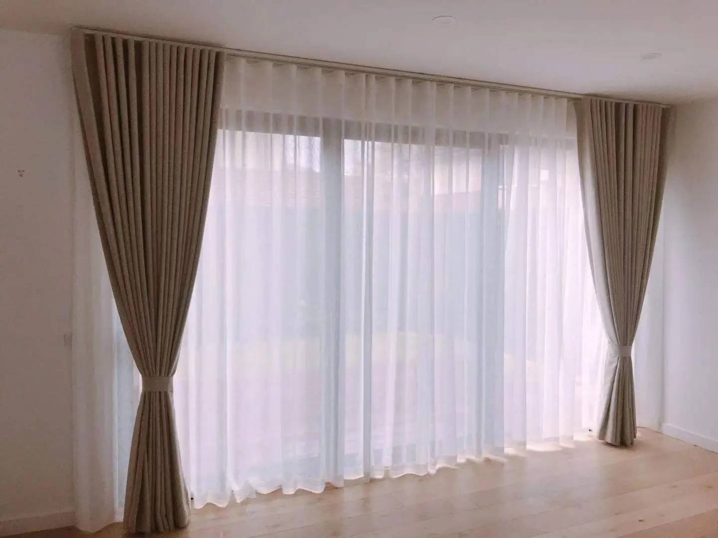 Elegant curtains frame the light in this living room.