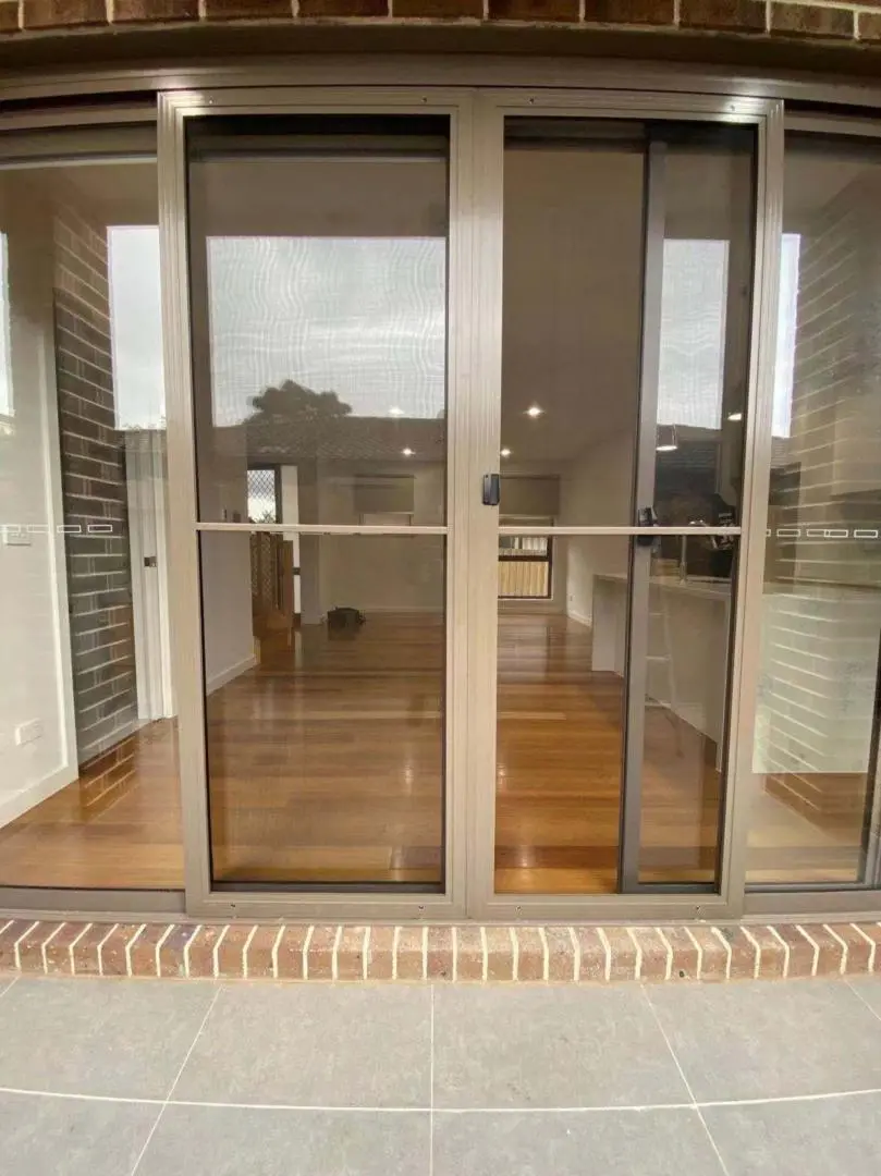 View of the interior through a sliding glass door.